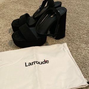 Never worn Larroude platform heels!